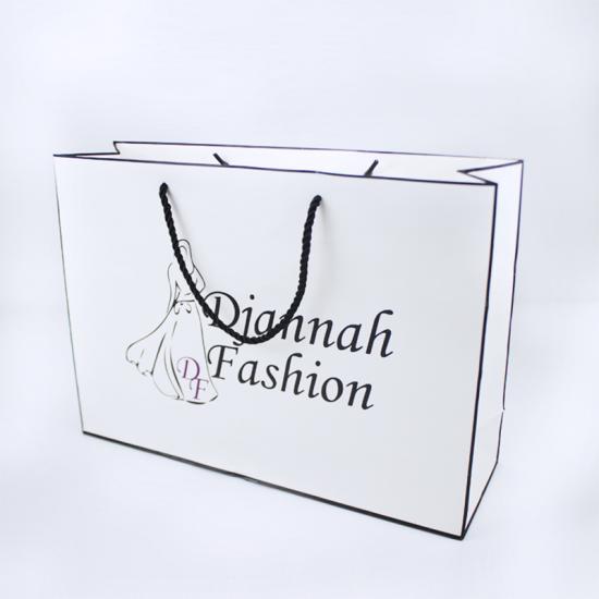 bolsa de papel para compras de ropa impresa personalizada manejas 